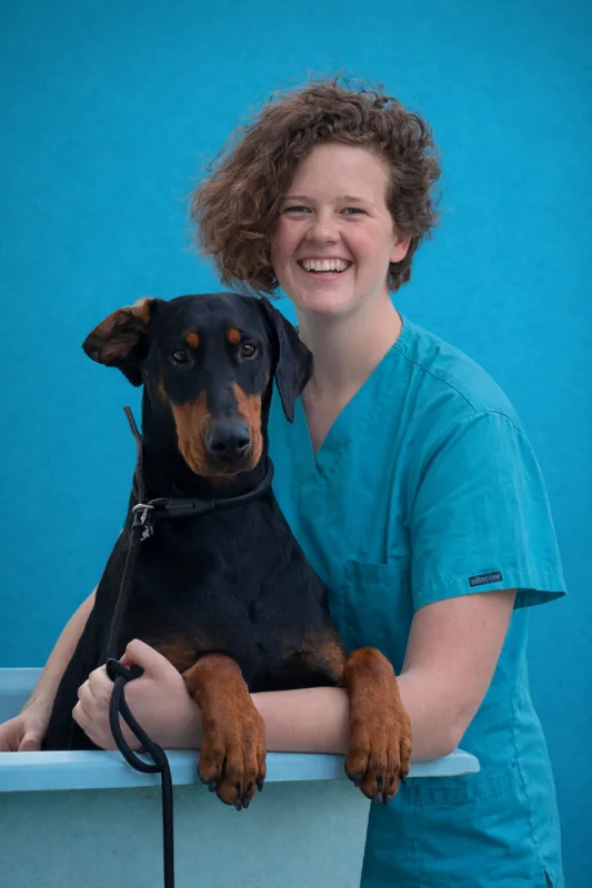 Alex with a Dobermann