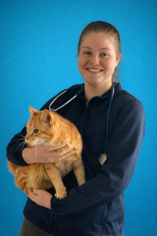 Erin holding a ginger cat