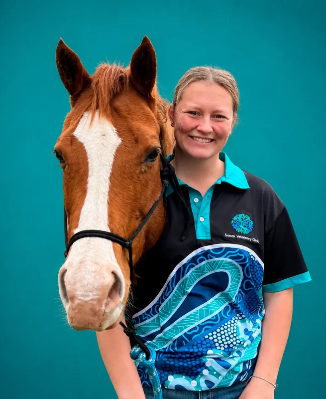 Kayla with a chestnut horse